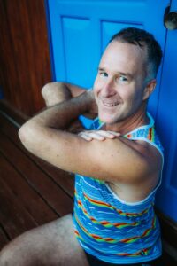 Yogi Aaron Doing a Seated Yoga Twist