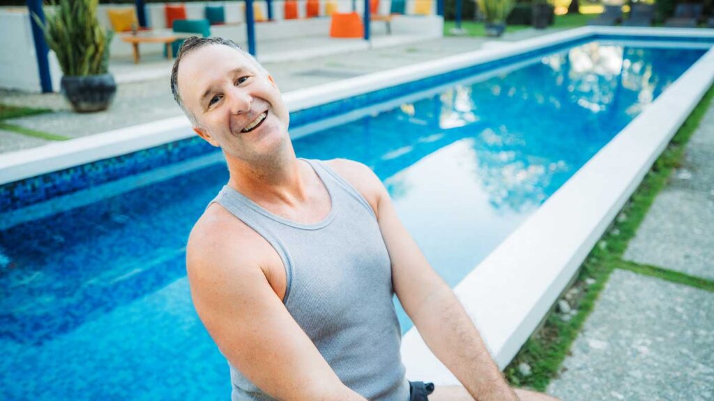 Yogi Aaron Sitting By Blue Osa Pool