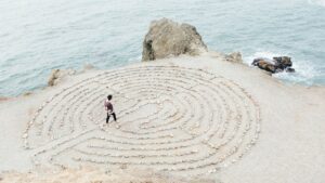 A person doing a walking meditation through a labyrinth