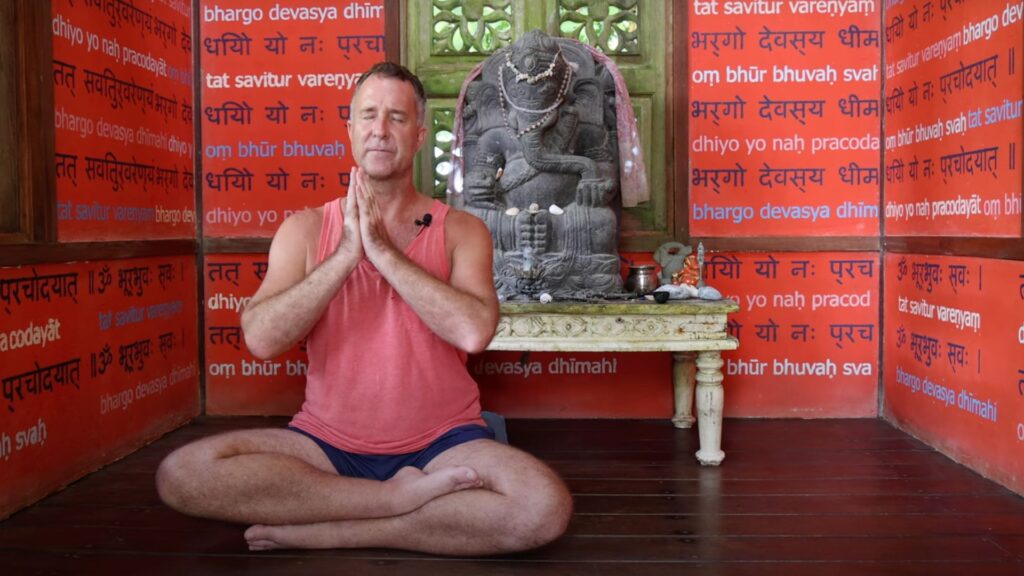 Yogi Aaron sitting in Meditation Temple at Blue Osa Yoga Retreat