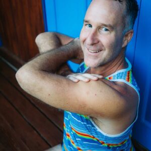 Yogi Aaron Doing a Seated Yoga Twist