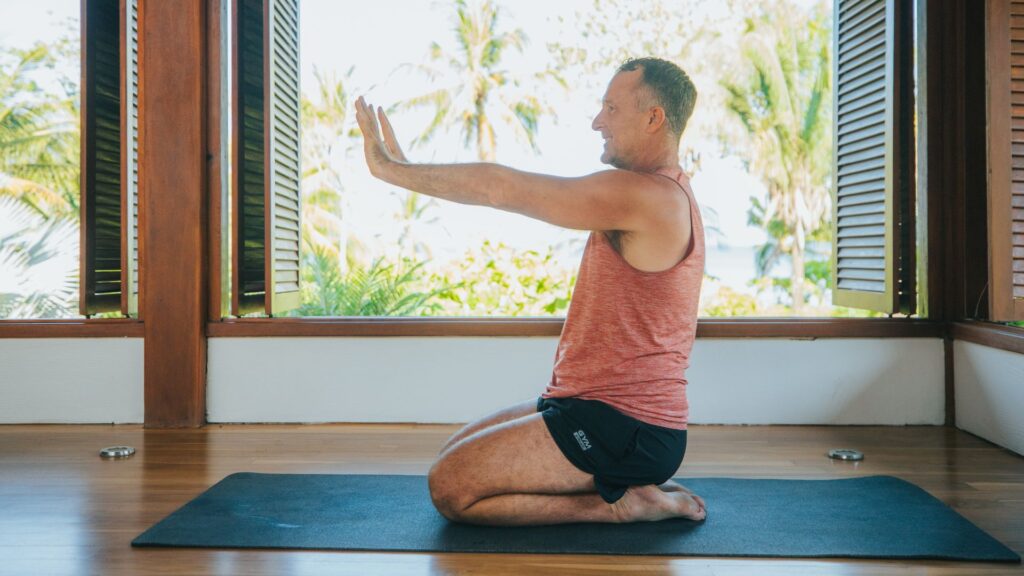 Yoga Aaron demonstrating 360 Shoulder Rotation