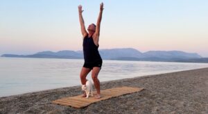 yoga for energy with yogi aaron greece beach 10 chair pose