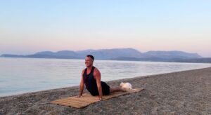 yoga for energy with yogi aaron greece beach 13 upward facing dog pose