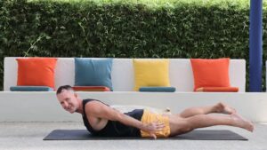 Yoga to stay young with Yogi Aaron shalabhasana pose