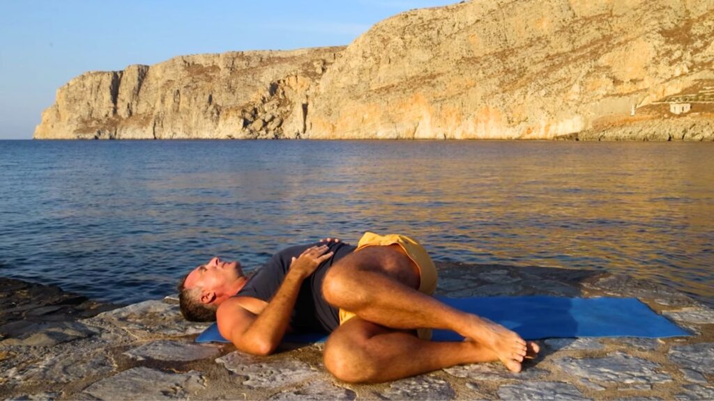 Reclined twist demonstrated by Yogi Aaron