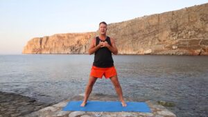 Yogi Aaron demonstrating hands over heart for bhavana or affirmation