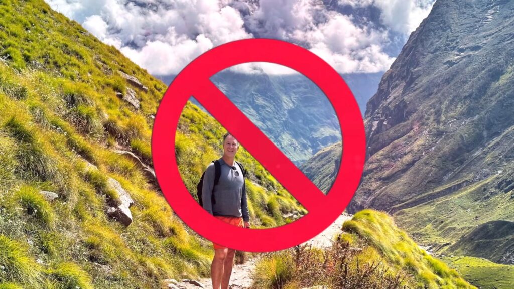 Yogi Aaron hiking in the Himalayas with a 'NO' red circle over him.